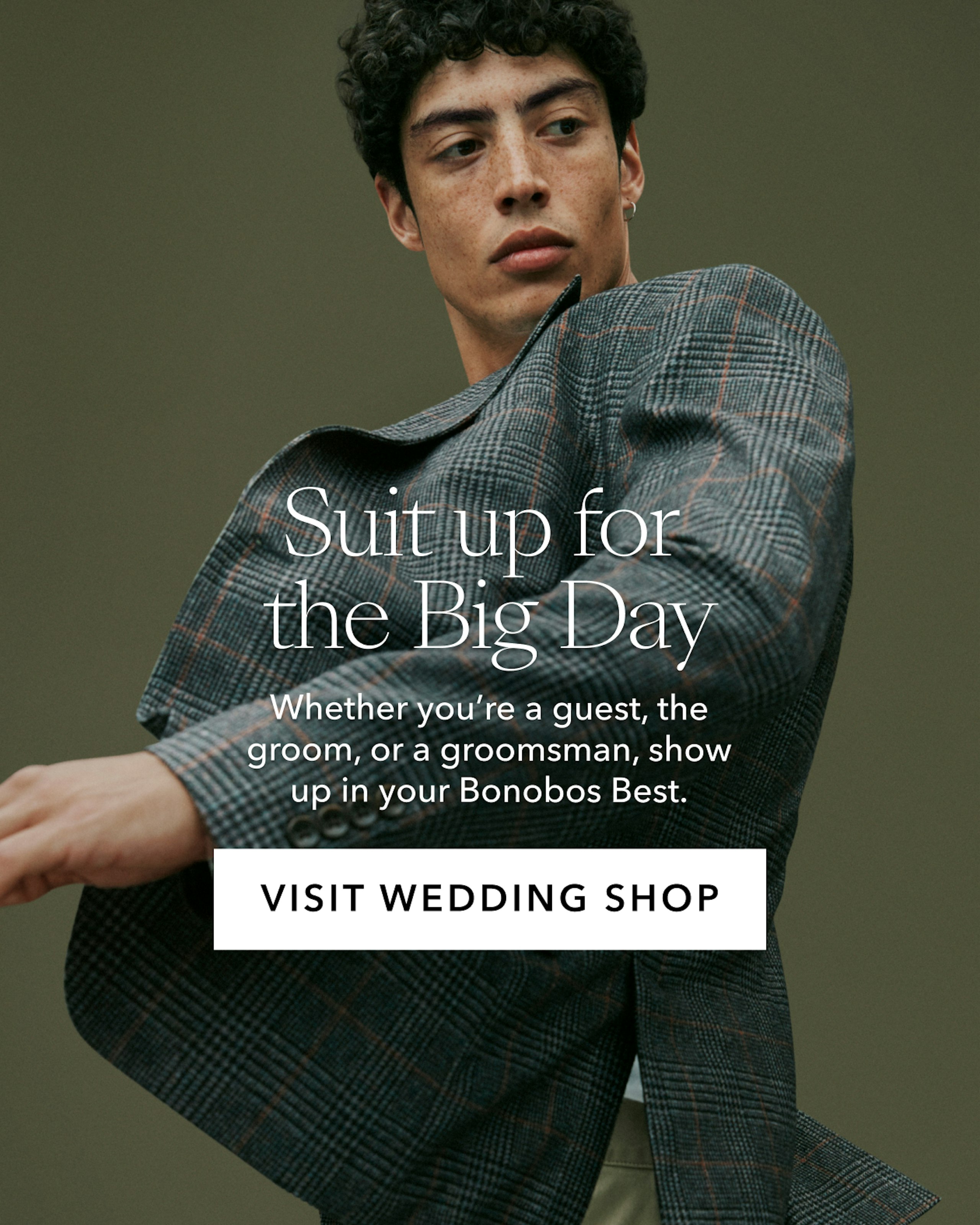 Man in suit, text reads: Suit up for the Big Day Whether you’re a guest, the groom, or a groomsman, show up in your Bonobos Best. VISIT WEDDING SHOP