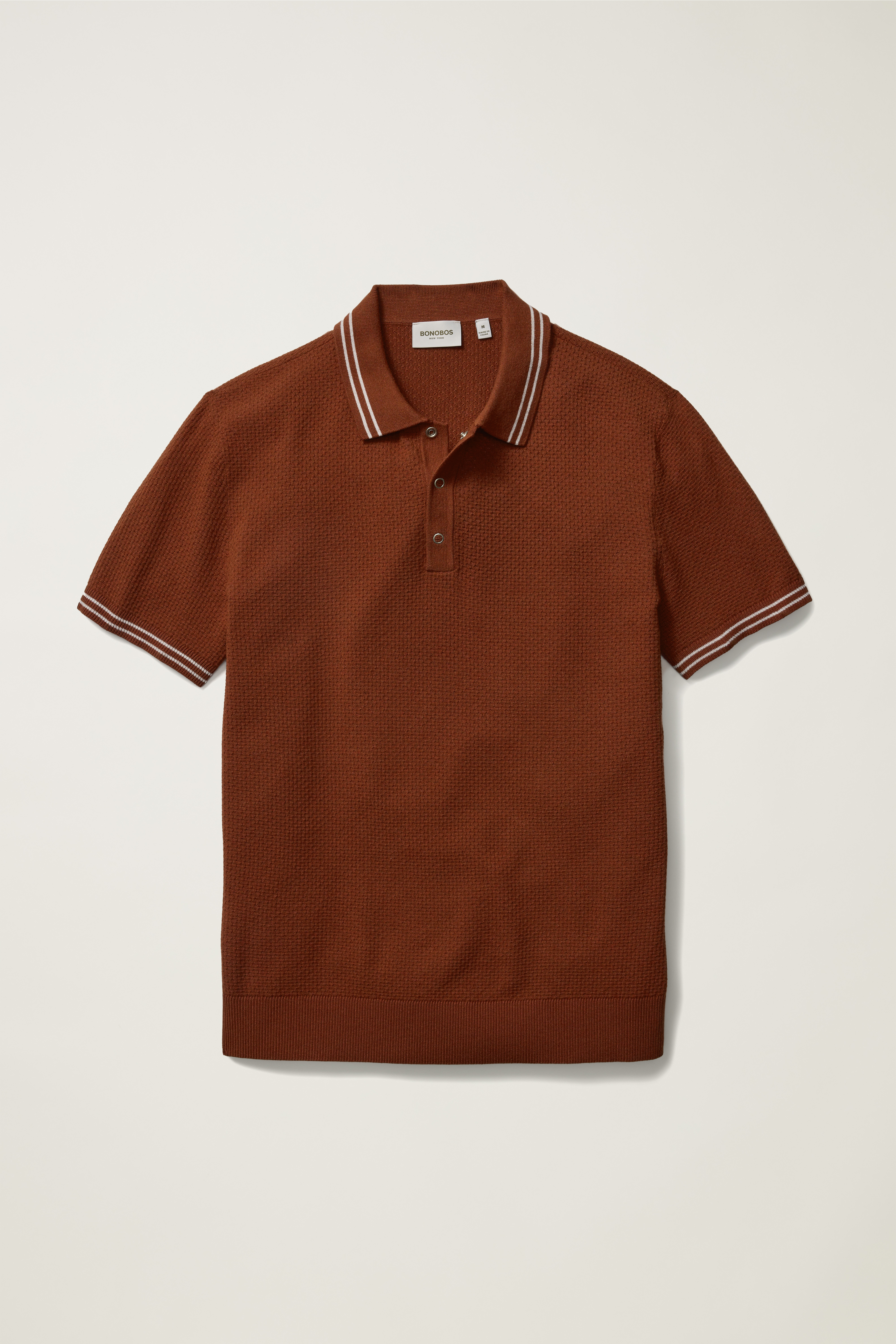 image of model wearing the Performance Golf Polo