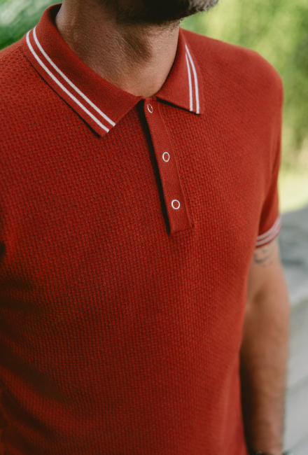 image of model wearing the Performance Golf Polo