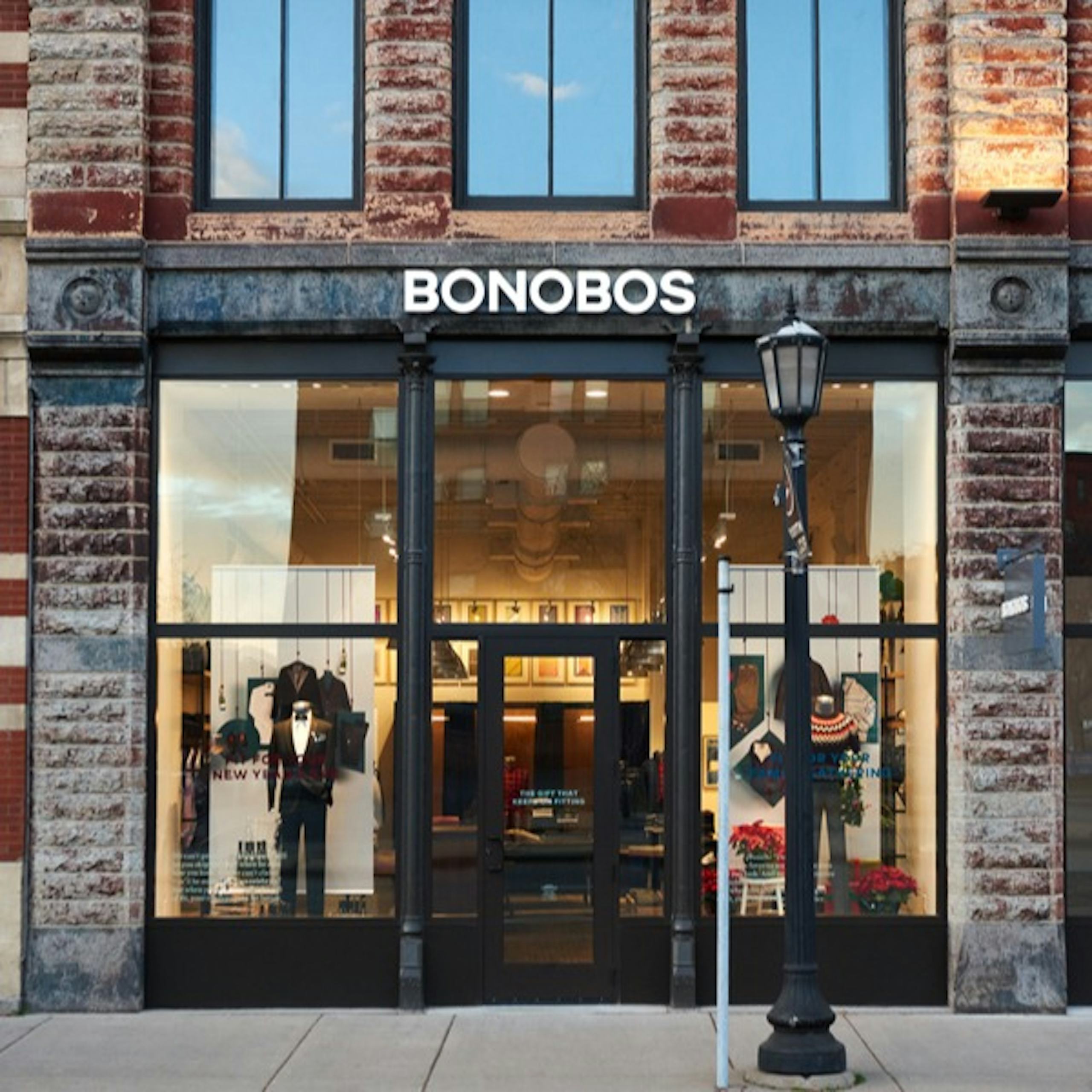 Image of Bonobos Store display in North Loop, Minneapolis. Display shows casual shirts, chinos, Suits and Blazers. 